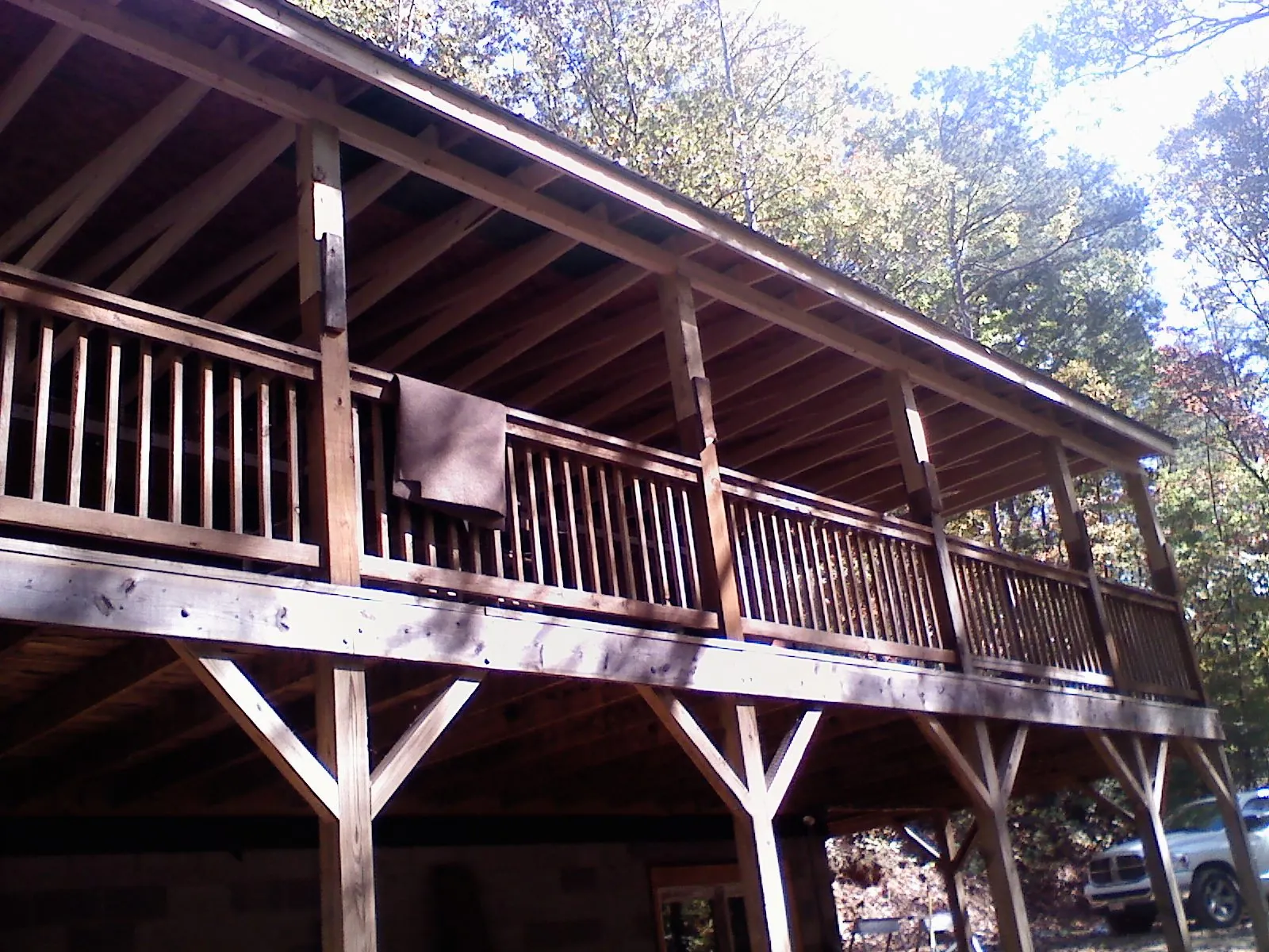 Timber framing under a new elevated porch and deck — Roof Leak Repair in Garrett by Roofing Brothers